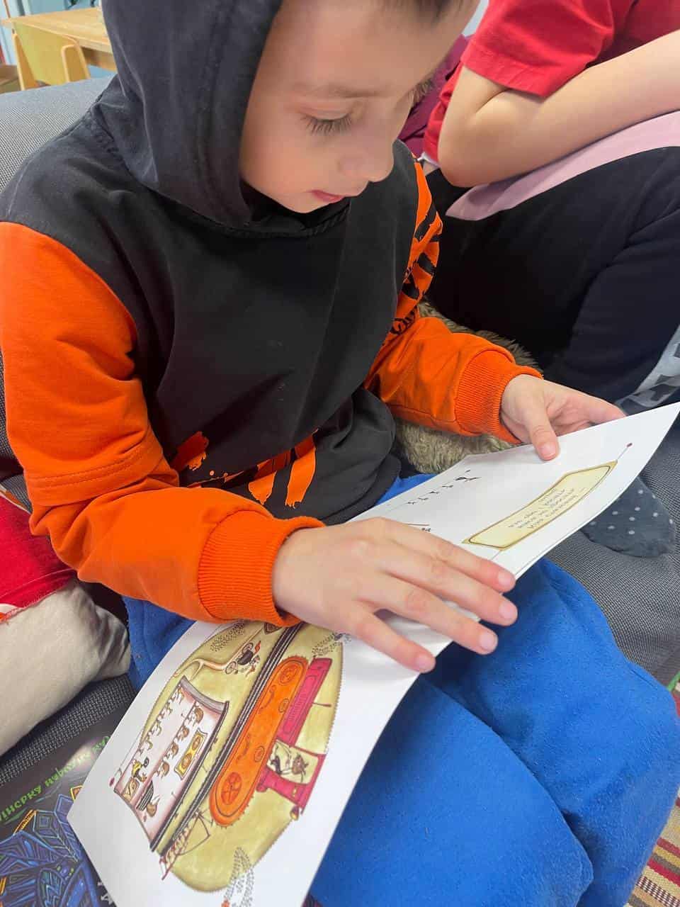 Boy reading book